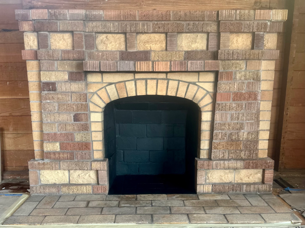 black firebox in fireplace cleaned by Cali Chimney.