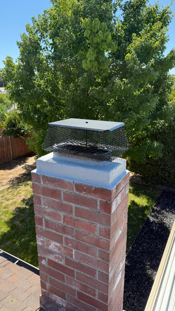 chimney cap repair on brick chimney on rooftop in the bay area, california