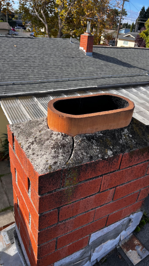 chimney repair on red brick chimney with missing chimney cap.